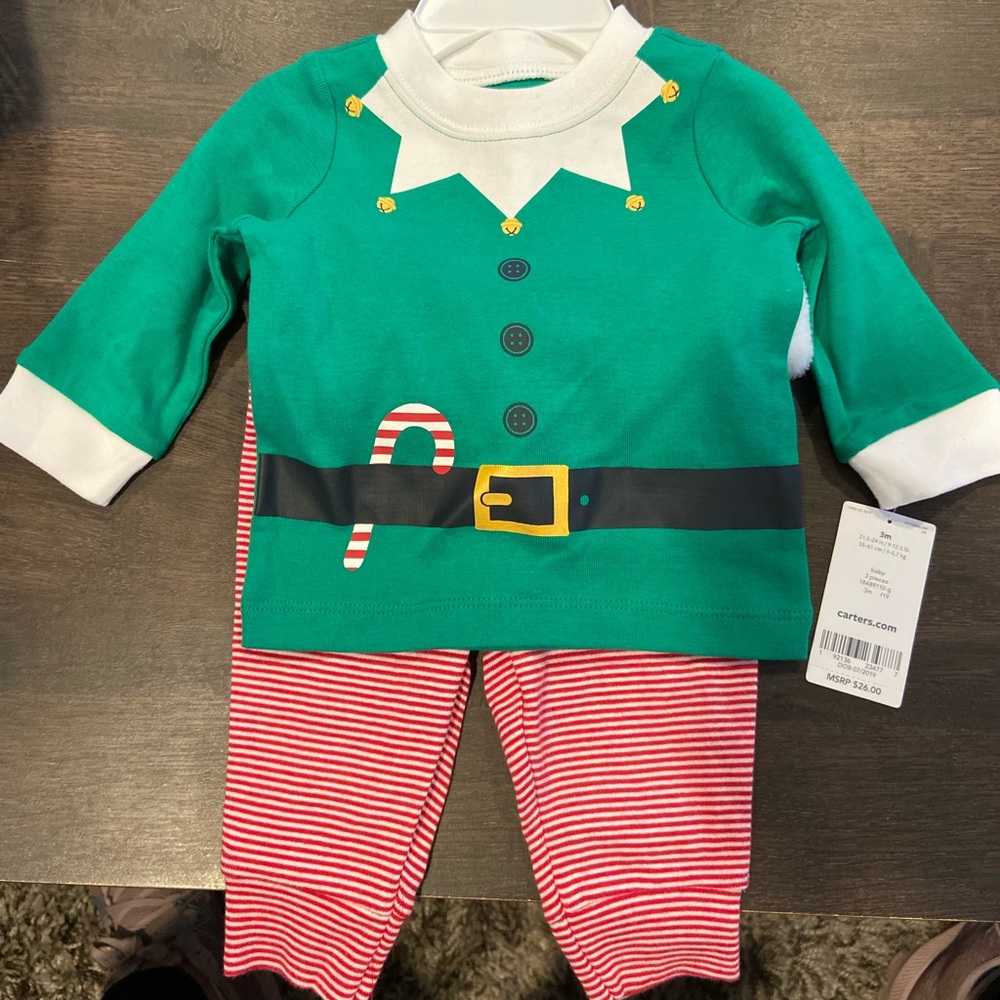 Carter’s Christmas elf outfit.